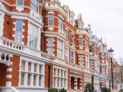 A street made up of brick-built apartments and townhouses in South Kensington, London.